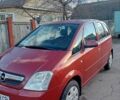 Червоний Опель Меріва, об'ємом двигуна 1.4 л та пробігом 180 тис. км за 4300 $, фото 1 на Automoto.ua