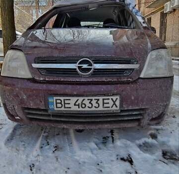 Красный Опель Мерива, объемом двигателя 1.6 л и пробегом 200 тыс. км за 1500 $, фото 1 на Automoto.ua