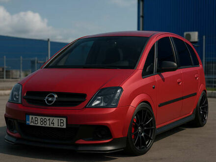 Красный Опель Мерива, объемом двигателя 1.6 л и пробегом 274 тыс. км за 3000 $, фото 1 на Automoto.ua