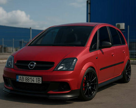 Красный Опель Мерива, объемом двигателя 1.6 л и пробегом 274 тыс. км за 3000 $, фото 1 на Automoto.ua