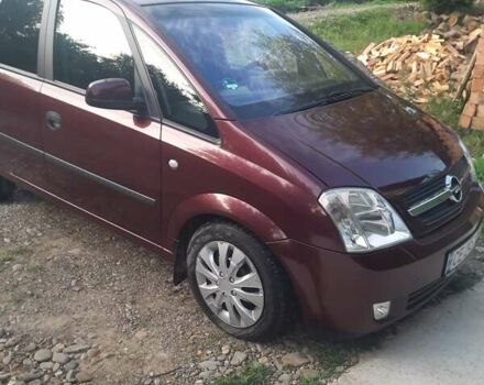 Красный Опель Мерива, объемом двигателя 1.8 л и пробегом 174 тыс. км за 4600 $, фото 1 на Automoto.ua