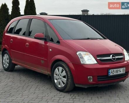 Красный Опель Мерива, объемом двигателя 1.6 л и пробегом 274 тыс. км за 2550 $, фото 1 на Automoto.ua