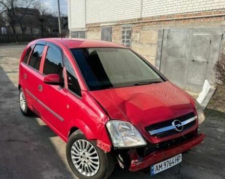 Красный Опель Мерива, объемом двигателя 1.7 л и пробегом 300 тыс. км за 2700 $, фото 1 на Automoto.ua