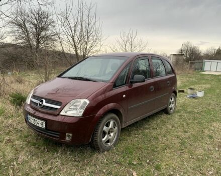 Красный Опель Мерива, объемом двигателя 1.7 л и пробегом 218 тыс. км за 3200 $, фото 1 на Automoto.ua