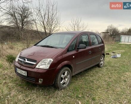 Красный Опель Мерива, объемом двигателя 1.7 л и пробегом 218 тыс. км за 3300 $, фото 1 на Automoto.ua