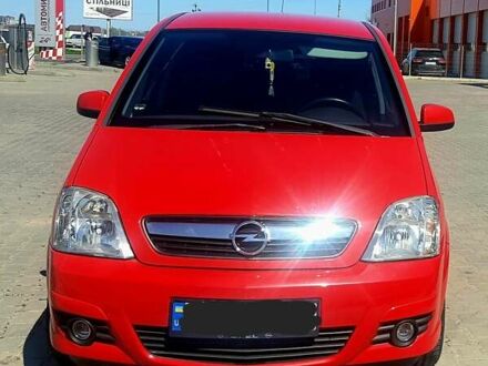 Красный Опель Мерива, объемом двигателя 1.7 л и пробегом 311 тыс. км за 3600 $, фото 1 на Automoto.ua