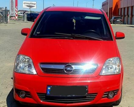 Красный Опель Мерива, объемом двигателя 1.7 л и пробегом 311 тыс. км за 3600 $, фото 1 на Automoto.ua