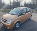 Желтый Опель Мерива, объемом двигателя 1.6 л и пробегом 180 тыс. км за 3000 $, фото 1 на Automoto.ua