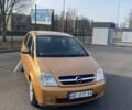 Желтый Опель Мерива, объемом двигателя 1.6 л и пробегом 180 тыс. км за 3000 $, фото 1 на Automoto.ua