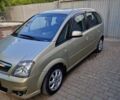 Желтый Опель Мерива, объемом двигателя 1.6 л и пробегом 134 тыс. км за 4500 $, фото 2 на Automoto.ua