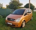 Желтый Опель Мерива, объемом двигателя 1.6 л и пробегом 229 тыс. км за 4000 $, фото 1 на Automoto.ua