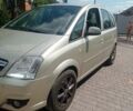 Желтый Опель Мерива, объемом двигателя 1.6 л и пробегом 242 тыс. км за 5500 $, фото 3 на Automoto.ua
