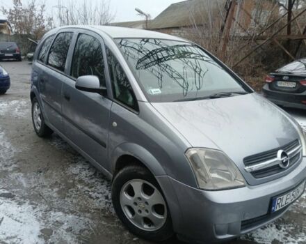 Серый Опель Мерива, объемом двигателя 1.7 л и пробегом 321 тыс. км за 1000 $, фото 3 на Automoto.ua