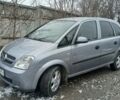 Серый Опель Мерива, объемом двигателя 1.7 л и пробегом 321 тыс. км за 1000 $, фото 12 на Automoto.ua