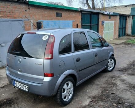 Серый Опель Мерива, объемом двигателя 1.7 л и пробегом 299 тыс. км за 1599 $, фото 3 на Automoto.ua