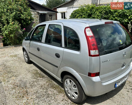 Серый Опель Мерива, объемом двигателя 1.6 л и пробегом 189 тыс. км за 3700 $, фото 7 на Automoto.ua