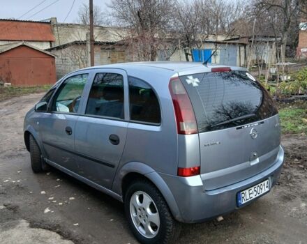 Серый Опель Мерива, объемом двигателя 1.7 л и пробегом 299 тыс. км за 1599 $, фото 2 на Automoto.ua