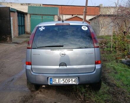 Серый Опель Мерива, объемом двигателя 1.7 л и пробегом 299 тыс. км за 1599 $, фото 5 на Automoto.ua