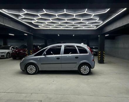 Серый Опель Мерива, объемом двигателя 1.6 л и пробегом 282 тыс. км за 4800 $, фото 4 на Automoto.ua