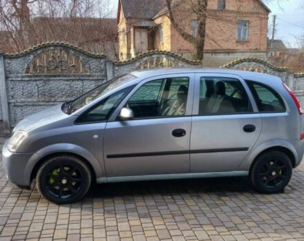 Серый Опель Мерива, объемом двигателя 1.6 л и пробегом 244 тыс. км за 4000 $, фото 2 на Automoto.ua