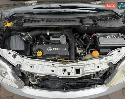 Серый Опель Мерива, объемом двигателя 1.69 л и пробегом 333 тыс. км за 3375 $, фото 8 на Automoto.ua