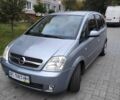 Серый Опель Мерива, объемом двигателя 1.36 л и пробегом 243 тыс. км за 4200 $, фото 1 на Automoto.ua