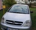 Серый Опель Мерива, объемом двигателя 1.3 л и пробегом 244 тыс. км за 3300 $, фото 1 на Automoto.ua