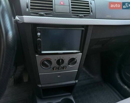 Серый Опель Мерива, объемом двигателя 1.6 л и пробегом 280 тыс. км за 4600 $, фото 9 на Automoto.ua