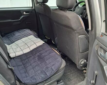 Серый Опель Мерива, объемом двигателя 1.3 л и пробегом 244 тыс. км за 3300 $, фото 9 на Automoto.ua