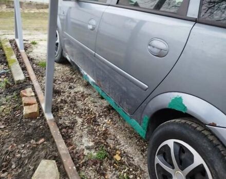 Серый Опель Мерива, объемом двигателя 1.7 л и пробегом 343 тыс. км за 1900 $, фото 5 на Automoto.ua