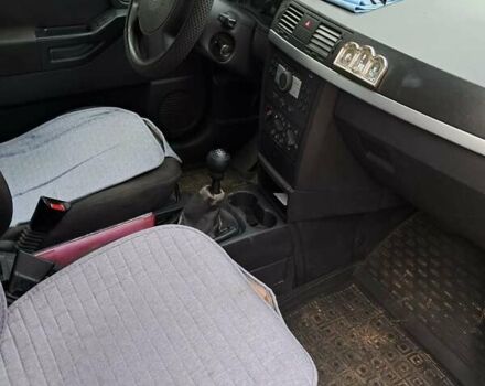 Серый Опель Мерива, объемом двигателя 1.3 л и пробегом 244 тыс. км за 3300 $, фото 12 на Automoto.ua