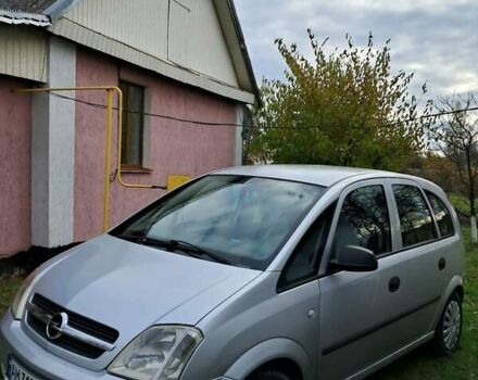 Серый Опель Мерива, объемом двигателя 1.3 л и пробегом 244 тыс. км за 3300 $, фото 3 на Automoto.ua