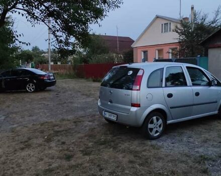 Серый Опель Мерива, объемом двигателя 1.7 л и пробегом 310 тыс. км за 3800 $, фото 1 на Automoto.ua