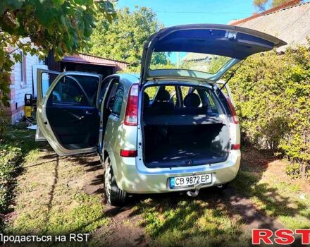 Серый Опель Мерива, объемом двигателя 1.6 л и пробегом 160 тыс. км за 5870 $, фото 6 на Automoto.ua