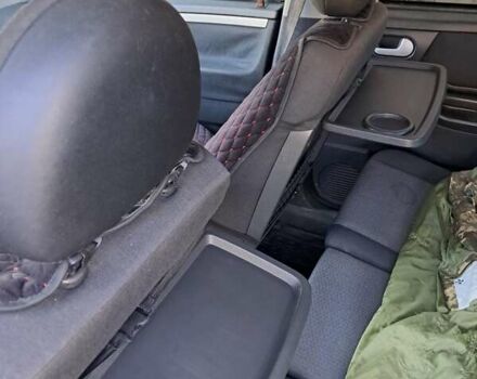 Серый Опель Мерива, объемом двигателя 1.6 л и пробегом 262 тыс. км за 2900 $, фото 12 на Automoto.ua