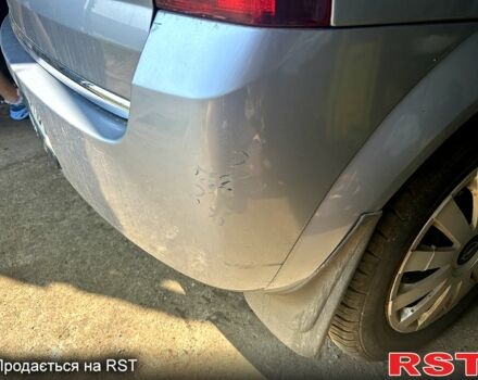 Серый Опель Мерива, объемом двигателя 1.4 л и пробегом 305 тыс. км за 3700 $, фото 6 на Automoto.ua