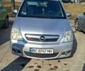 Серый Опель Мерива, объемом двигателя 1.2 л и пробегом 230 тыс. км за 4100 $, фото 1 на Automoto.ua