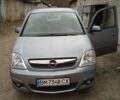 Серый Опель Мерива, объемом двигателя 1.36 л и пробегом 183 тыс. км за 4800 $, фото 1 на Automoto.ua