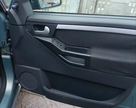 Серый Опель Мерива, объемом двигателя 1.6 л и пробегом 243 тыс. км за 4500 $, фото 5 на Automoto.ua