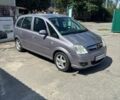 Серый Опель Мерива, объемом двигателя 1.25 л и пробегом 265 тыс. км за 3000 $, фото 4 на Automoto.ua