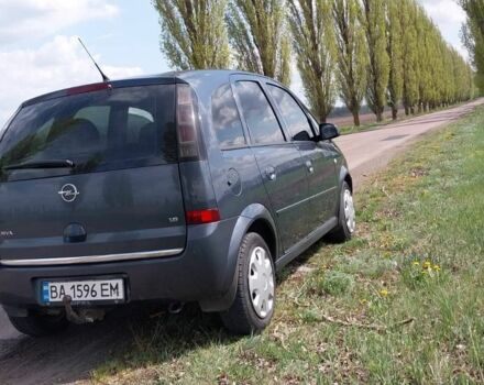 Серый Опель Мерива, объемом двигателя 1.6 л и пробегом 210 тыс. км за 4600 $, фото 1 на Automoto.ua