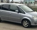 Серый Опель Мерива, объемом двигателя 1.6 л и пробегом 270 тыс. км за 4200 $, фото 1 на Automoto.ua
