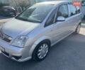Серый Опель Мерива, объемом двигателя 1.25 л и пробегом 254 тыс. км за 4400 $, фото 1 на Automoto.ua