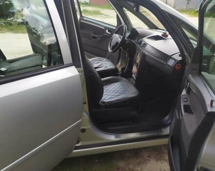 Серый Опель Мерива, объемом двигателя 1.2 л и пробегом 270 тыс. км за 3300 $, фото 4 на Automoto.ua