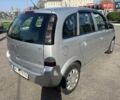 Серый Опель Мерива, объемом двигателя 1.25 л и пробегом 254 тыс. км за 4400 $, фото 5 на Automoto.ua