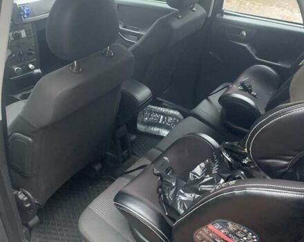 Серый Опель Мерива, объемом двигателя 1.4 л и пробегом 198 тыс. км за 4300 $, фото 4 на Automoto.ua