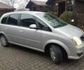 Серый Опель Мерива, объемом двигателя 1.4 л и пробегом 173 тыс. км за 5150 $, фото 2 на Automoto.ua