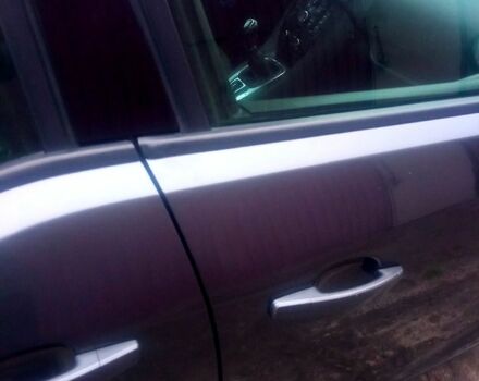 Серый Опель Мерива, объемом двигателя 1.3 л и пробегом 317 тыс. км за 7500 $, фото 6 на Automoto.ua