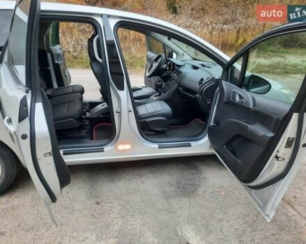 Серый Опель Мерива, объемом двигателя 1.69 л и пробегом 198 тыс. км за 7200 $, фото 10 на Automoto.ua