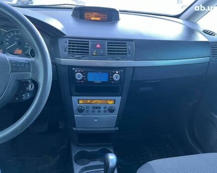 Серый Опель Мерива, объемом двигателя 1.8 л и пробегом 221 тыс. км за 5590 $, фото 26 на Automoto.ua